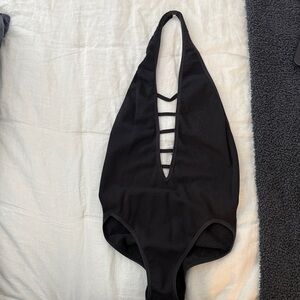 Black backless halter body suit